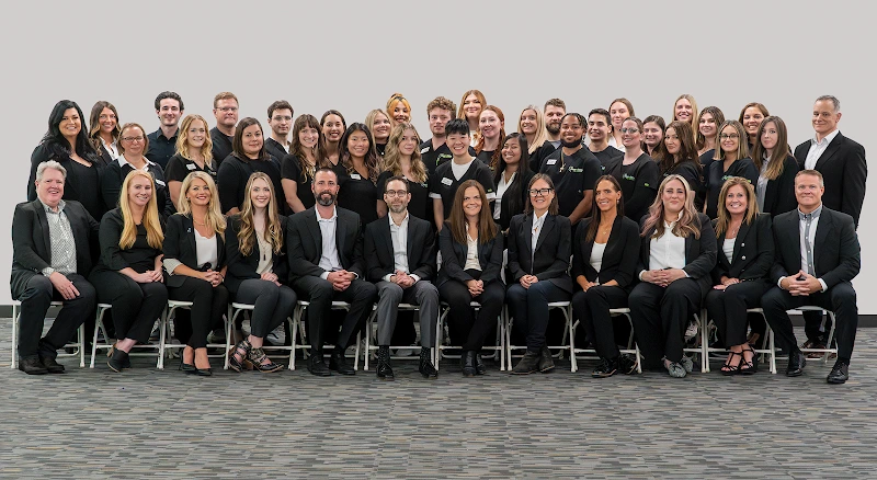 NeuroStim TMS Spokane team of approximately 40 staff members in professional attire