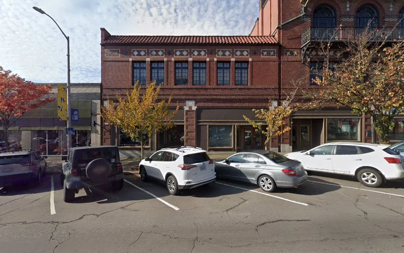 NorthStar TMS Vancouver clinic storefront in historic brick building with parked cars