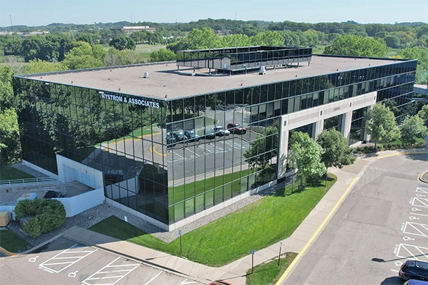 Nystrom & Associates Eden Prairie building exterior with glass facade and parking lot