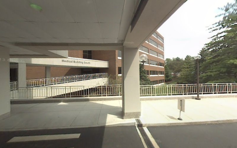 Medical Building South entrance with covered walkway and railing