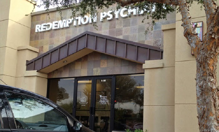 Redemption Psychiatry storefront with illuminated signage in Chandler