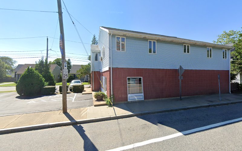 Riverside Counseling Center exterior building with blue and red metal siding