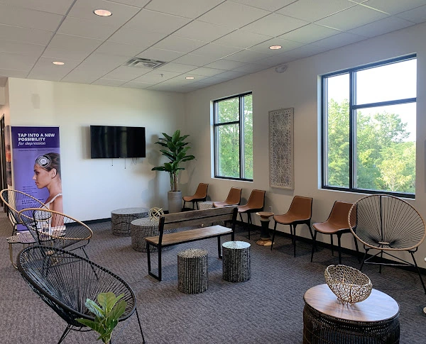 Serenity Behavioral Health & Wellness waiting room with comfortable seating, large windows, and modern d&eacute;cor