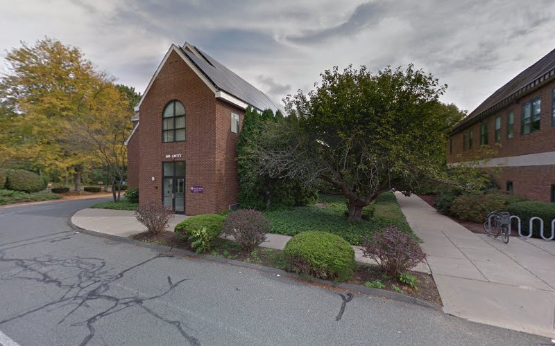 ServiceNet Inc. Amherst Outpatient Clinic brick building with peaked roof and landscaping