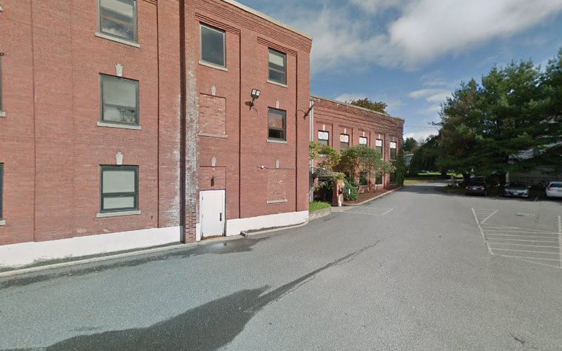 ServiceNet Inc. Greenfield outpatient clinic, red brick building with parking area