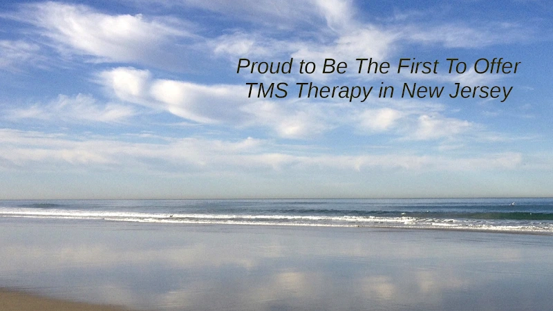 Beach scene with text: Proud to Be The First To Offer TMS Therapy in New Jersey
