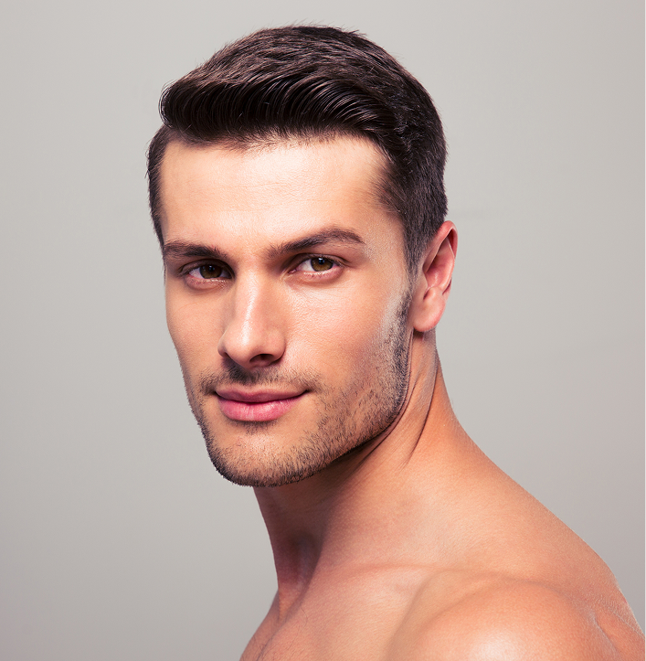 Man's face showing well-groomed eyebrows and facial hair definition