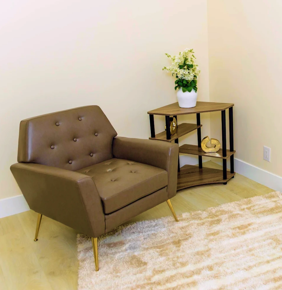 Leather armchair and side table in the Uriel Behavioral Wellness Northridge office