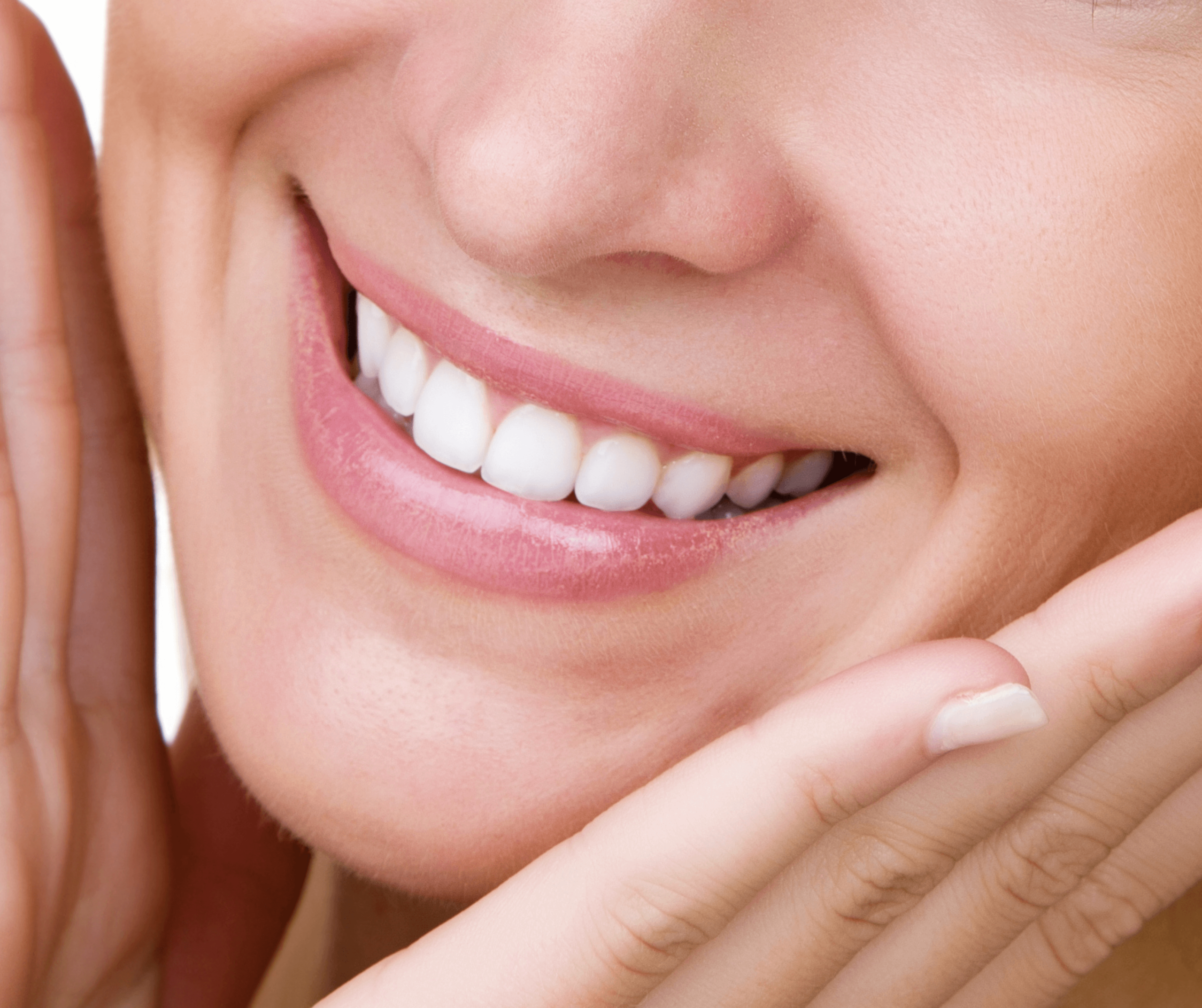 Woman smiling showing white teeth and manicured nails