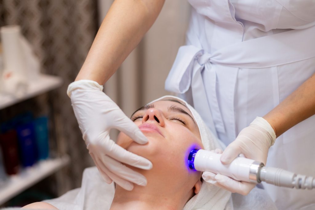 Doctor giving skin treatment