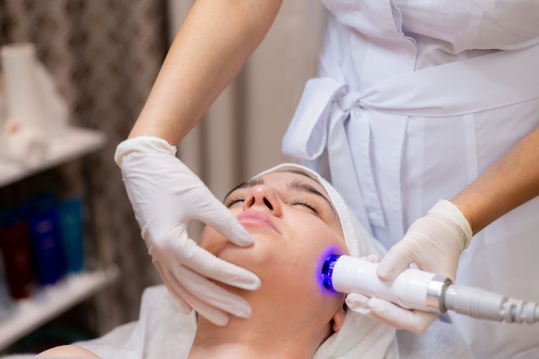 Doctor giving skin treatment