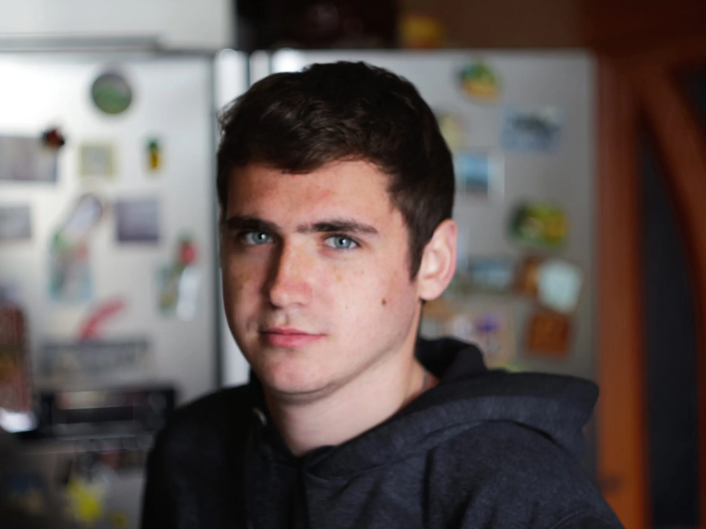 Young man indoors with a calm expression – SPRAVATO treatment patient