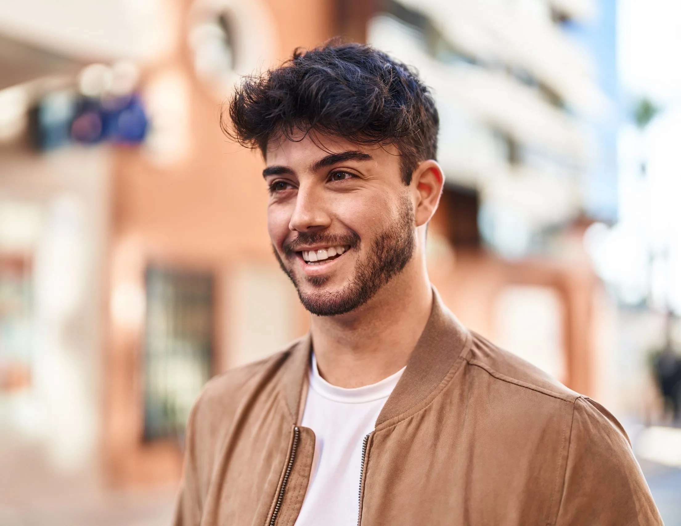 Young Hispanic man smiling confidently – SPRAVATO treatment in Walnut Creek, CA