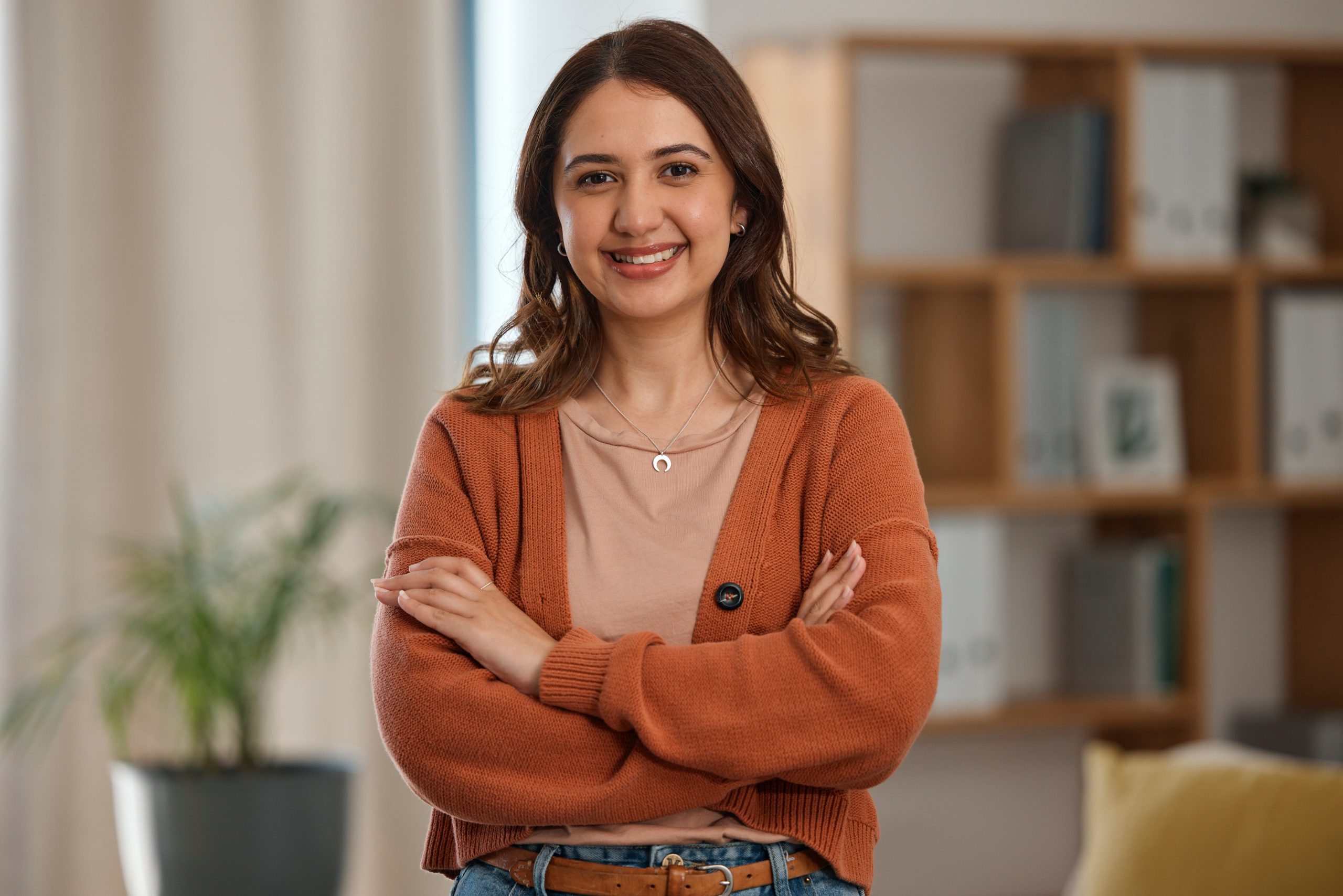 Happy woman with arms crossed, creative professional – SPRAVATO treatment in Dublin, CA