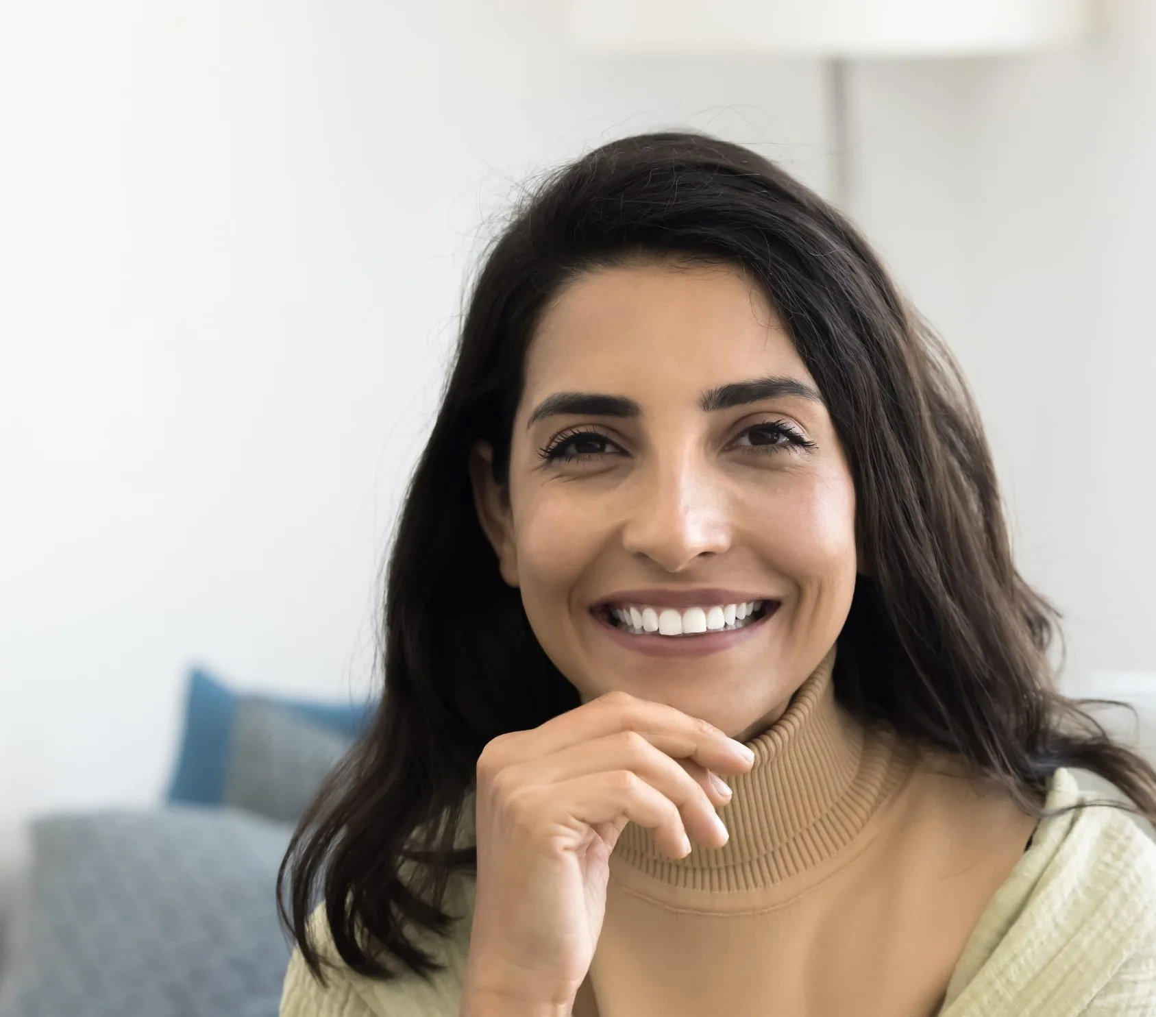 Cheerful middle-aged Latina woman looking at the camera – depression treatment patient