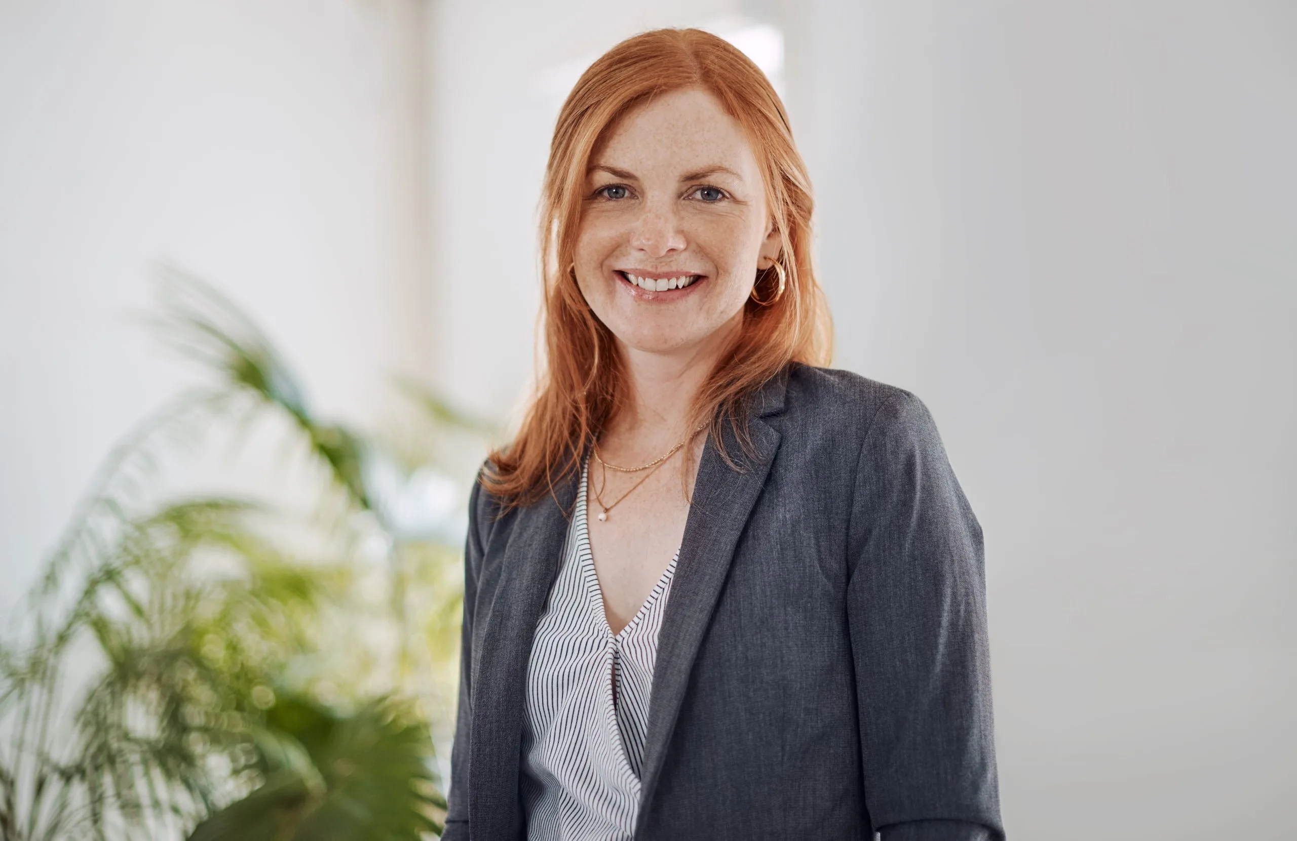 Smiling businesswoman in an office portrait – SPRAVATO treatment in Walnut Creek, CA