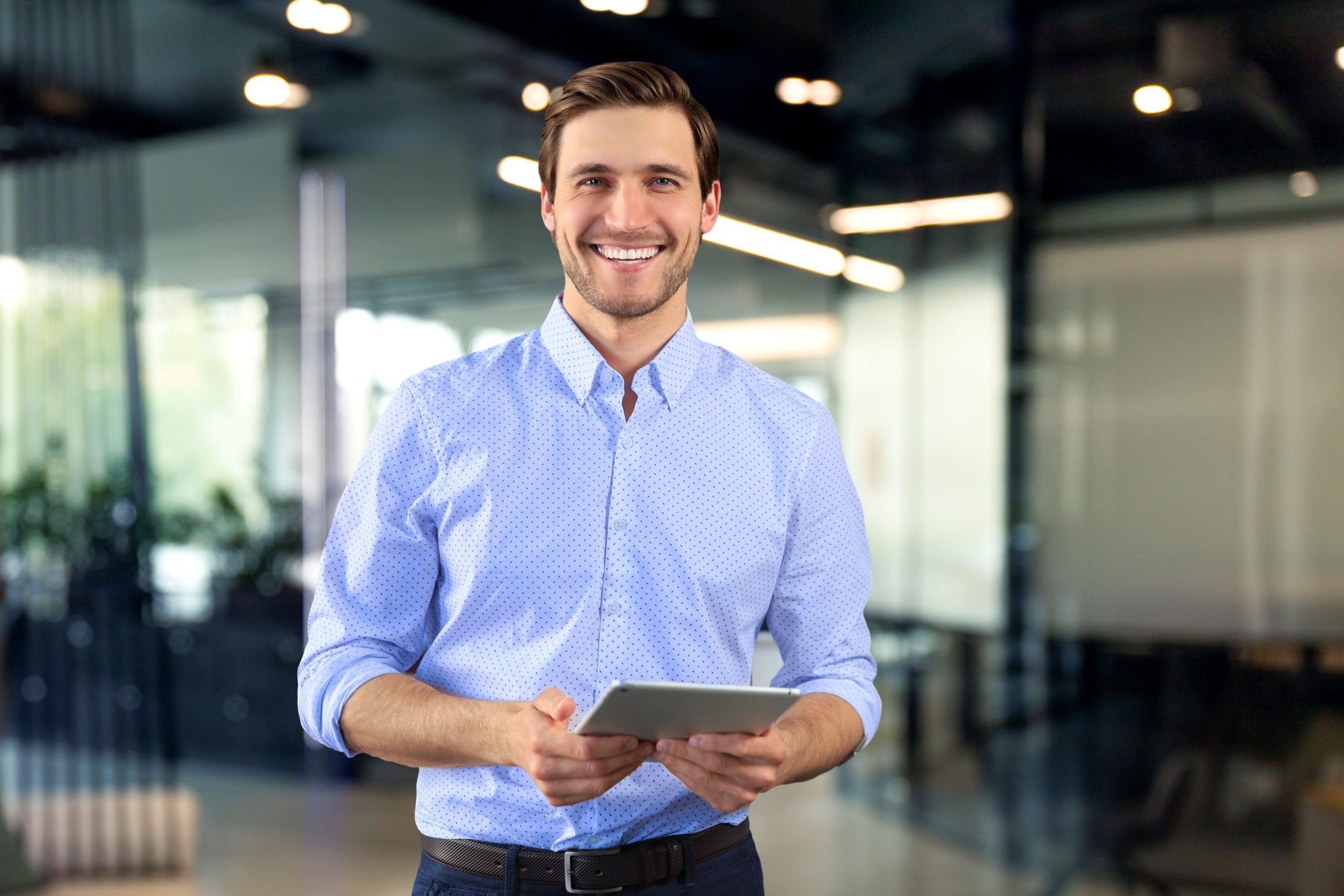 Businessman in formal wear using a digital tablet – psychiatrist in Concord, CA