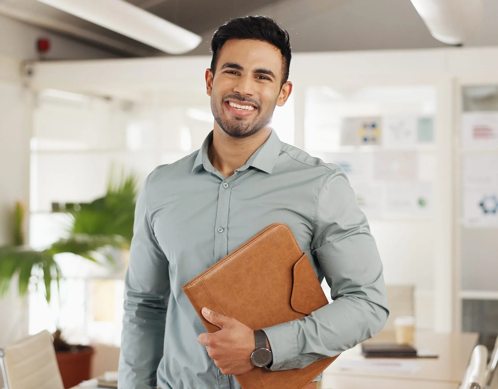 Smiling businessman in a modern office – SPRAVATO treatment in Moraga, CA