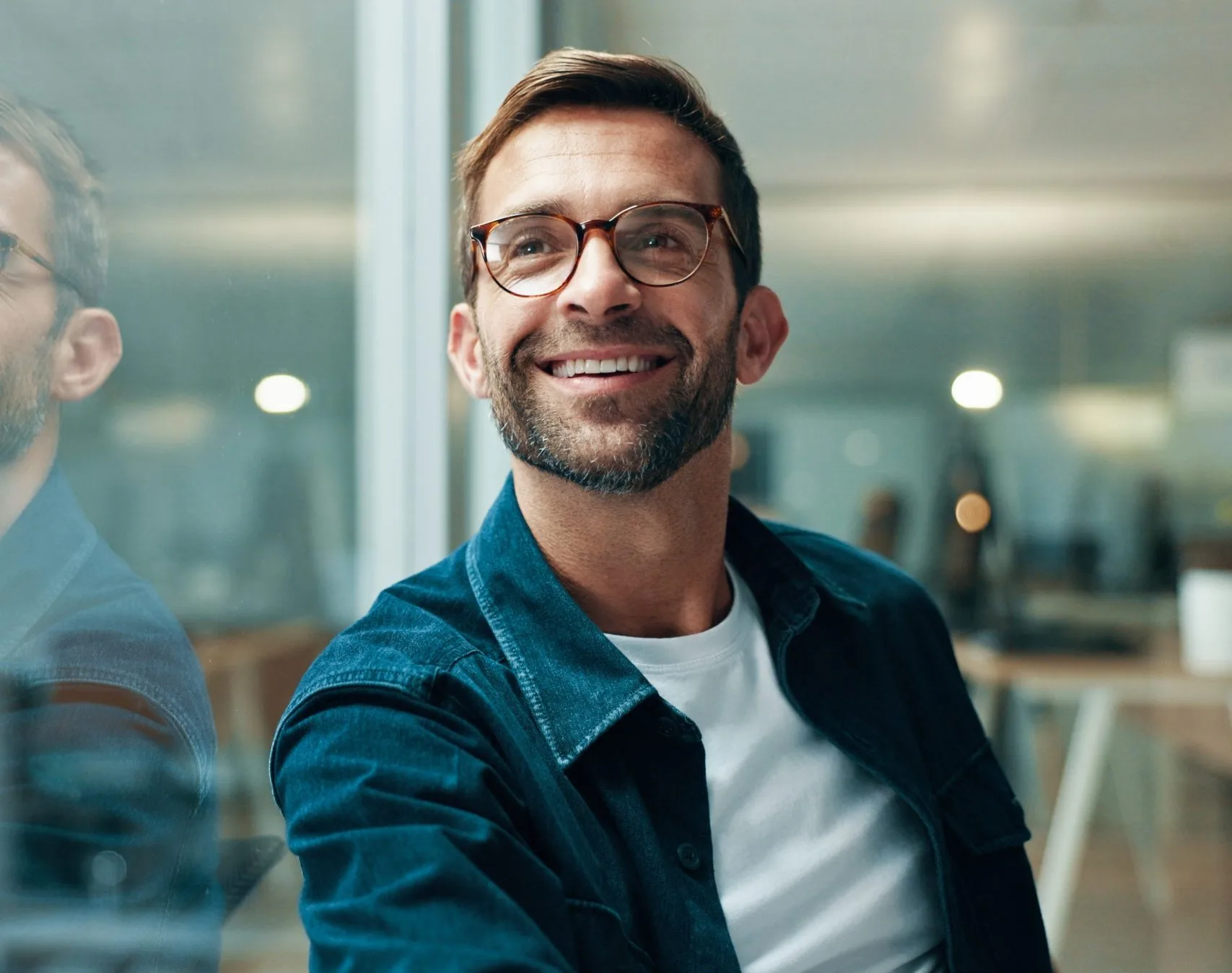 Happy businessman reflecting thoughtfully – psychiatrist in San Ramon, CA