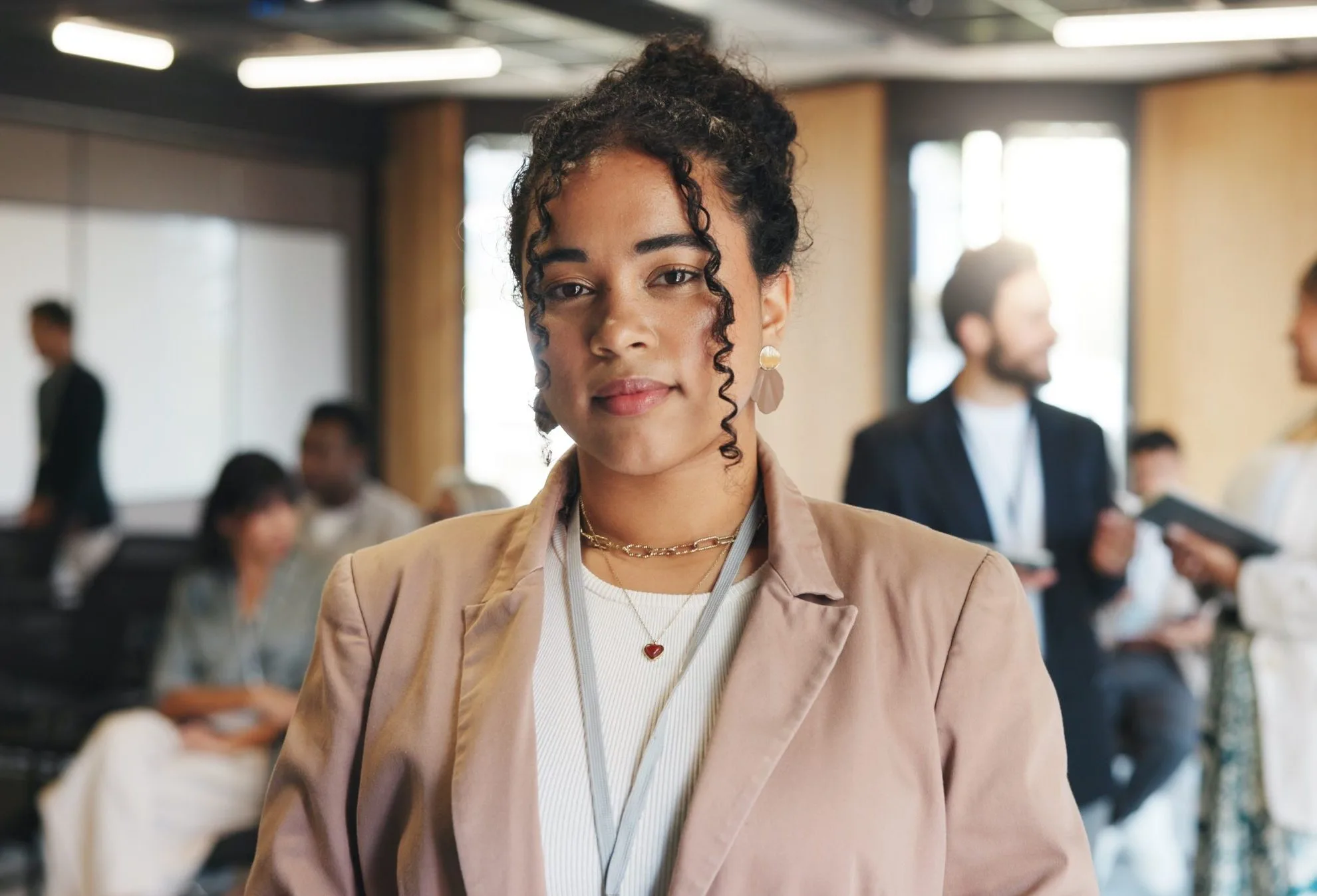 Confident businesswoman at a conference – OCD treatment patient