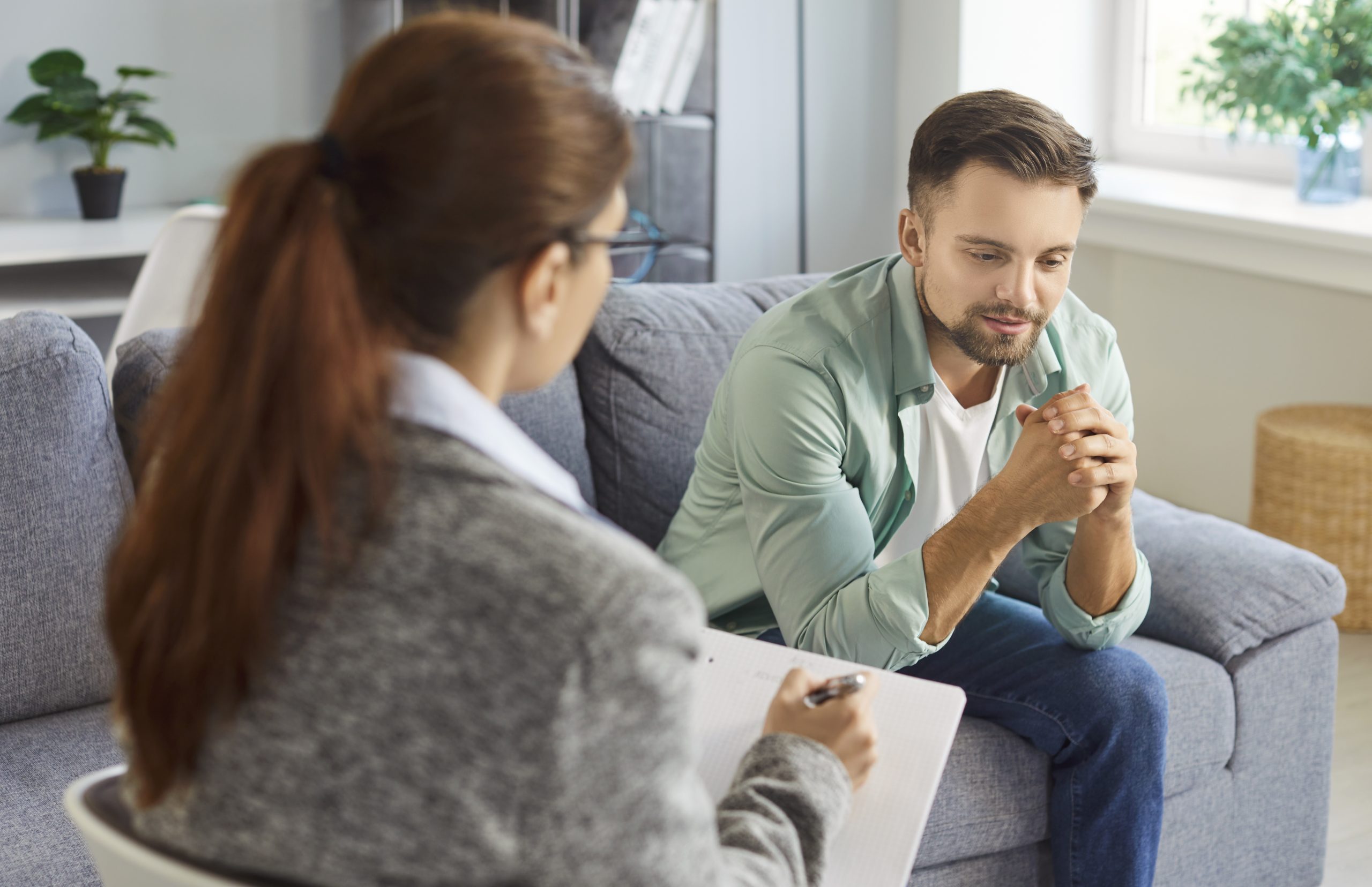 Man meeting with a psychologist for a counseling session – psychiatrist in Concord, CA