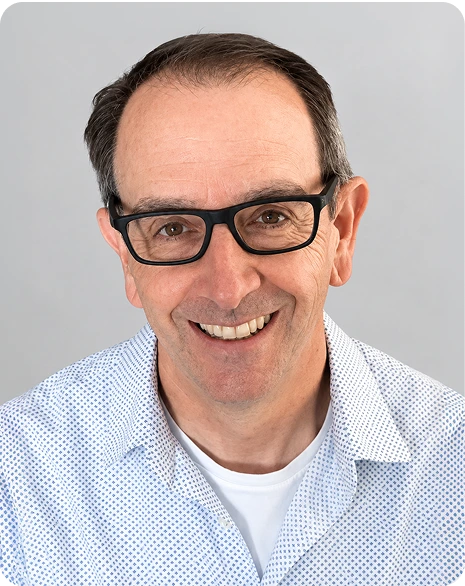 Daniel James, LPC, headshot portrait smiling at camera