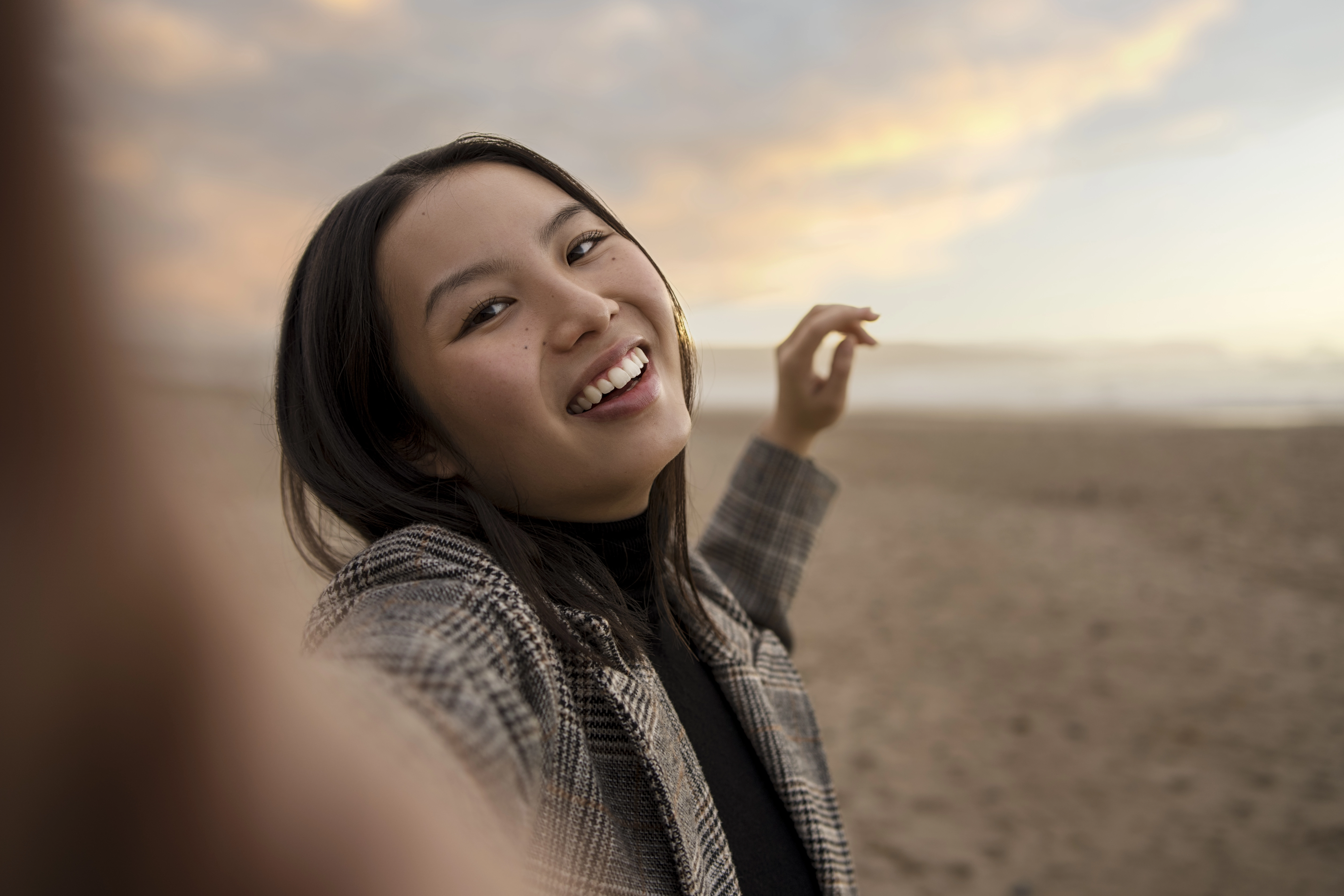 Smiling woman at the beach