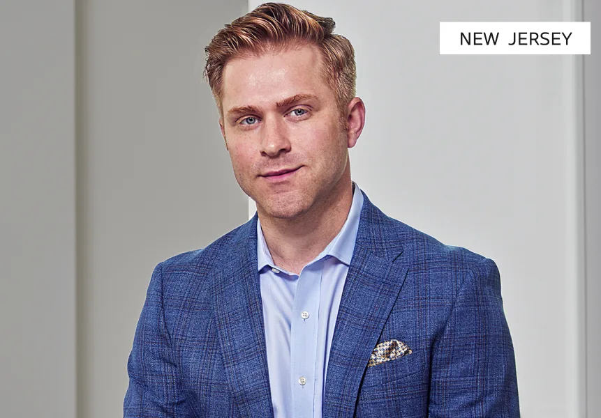 NEW JERSEY – Plastic surgeon in blue plaid blazer, professional headshot