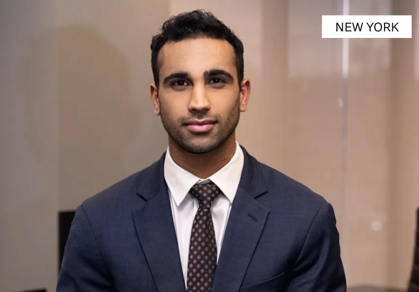 NEW YORK – Plastic surgeon in navy suit and patterned tie, professional headshot