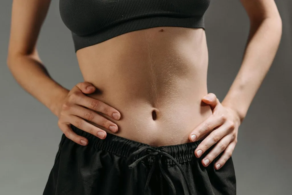 What Are Key Benefits of a Tummy Tuck Beyond Fat Removal? Banner