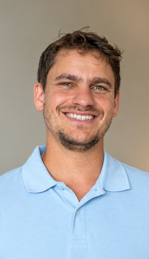 David, a Myers Medical team member, smiling in a light blue polo shirt